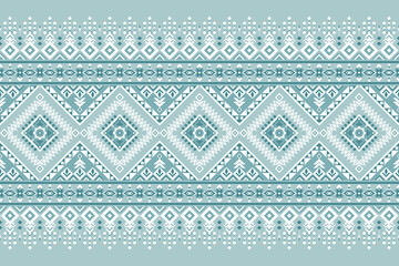 Seamless ethnic geometric pattern in teal and white, perfect for textile design, crafts, digital prints, and cultural decorative projects.
