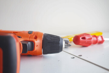 Tools arranged on a workbench for home improvement tasks