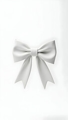 Naklejka premium Elegant White Ribbon Bow Isolated on Plain Background