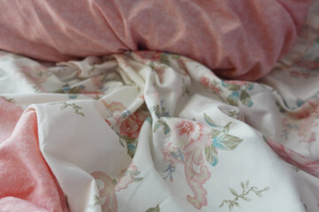 messy bed at early morning 
