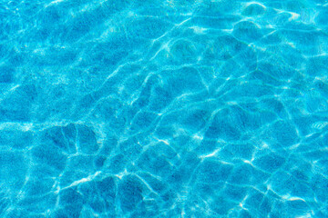 Sunlight Ripples on Blue Water