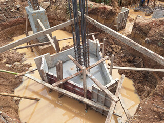 A triangular foundation formwork  in place, ready for concrete pouring. Deep Foundation, Pile Footing.