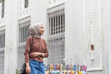 Indonesian Muslim Woman in Hijab Walking in Kota Lama Semarang Old Town Indonesia