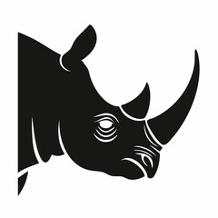 Fototapeta premium Silhouette of a rhinoceros' head, captured from the side, with its large horn, strong face, and tough skin texture, showcasi