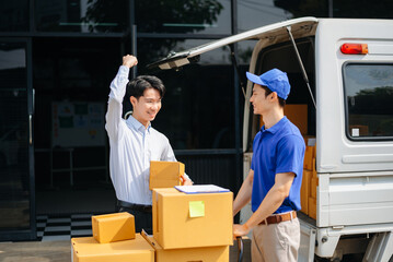 Delivery Asian man by sending box of parcel to customers service at home