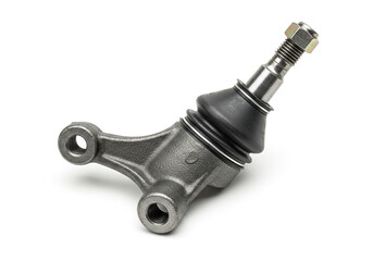 Close up of a ball joint with a nut on a threaded rod on a white surface in a studio setting