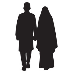 Silhouette of a man and woman couple standing together