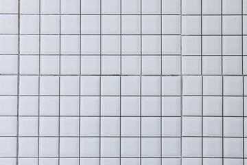 Close Up Of White Tiled Wall Or Floor Creating Grid Pattern