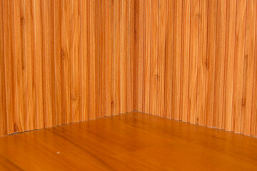 Wooden Panel Wall With Wooden Flooring In The Corner