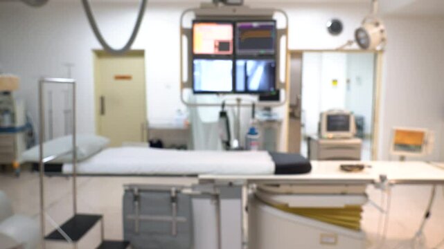 Blurred of catheterization laboratory or Cath Lab in a hospital or clinic with diagnostic imaging equipment used to visualize the heart arteries and also surgical operations.