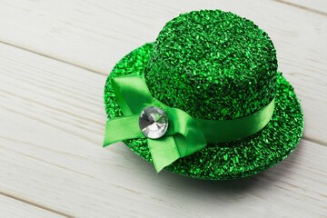 Close-up of glittery green hat