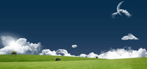Green landscape against sky