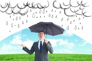 Composite image of man protecting from the rain with umbrella