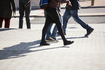 People walking on sidewalk