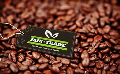 Fair Trade label tag is resting on roasted coffee beans in flat design, with white string © vectorfusionart