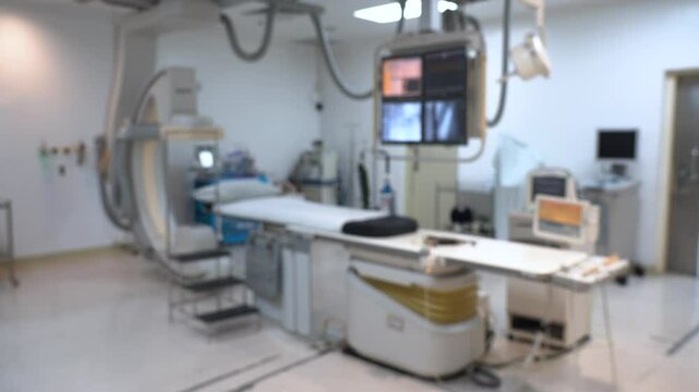 Blurred of catheterization laboratory or Cath Lab in a hospital or clinic with diagnostic imaging equipment used to visualize the heart arteries and also surgical operations.