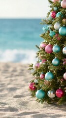 Christmas tree decorated with colorful ornaments on a sandy beach. Tropical Christmas and new year holiday celebration by the ocean.