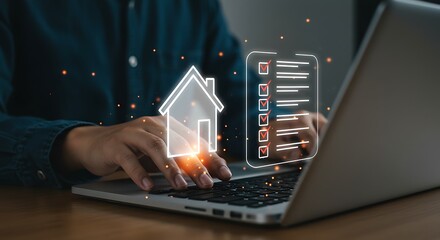 Person using a laptop to manage property tasks and home ownership