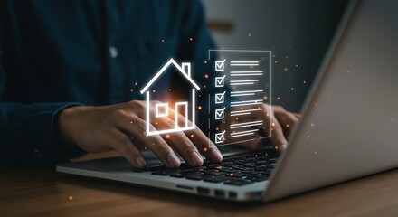 Person using a laptop to manage property tasks and home ownership