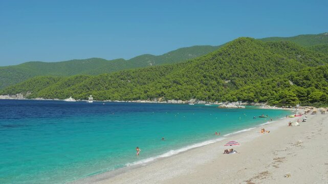 Skopelos, Greece - August 25, 2018: The amazing Milia beach on Skopelos island in Greece