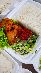 healthy food rich in protein and carbohydrates with a rice and chicken menu