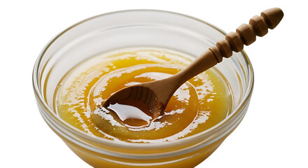 Golden honey in glass bowl with wooden spoon yellow