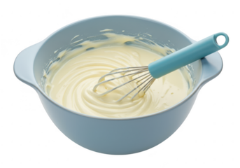A light blue bowl holds creamy batter, a whisk rests inside isolated on transparent background