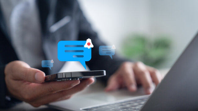 Smartphone user with notification bell icon on virtual screen. Notification concept. Push notifications. Web notifications. Schedule and announcements.