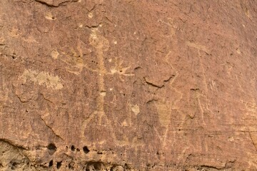 Petroglyph of a person at Aztec Arches area, New Mexico.