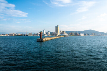 Fototapeta premium View of Takamatsu Port and the lighthouse from the sea at sunset