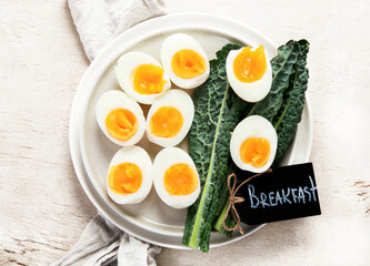 Plate with halves of delicious boiled eggs.