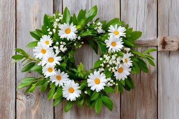 Beautiful daisy wreath hanging on rustic wooden door