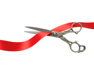 Silver scissors cutting a vibrant red ribbon isolated on transparent background