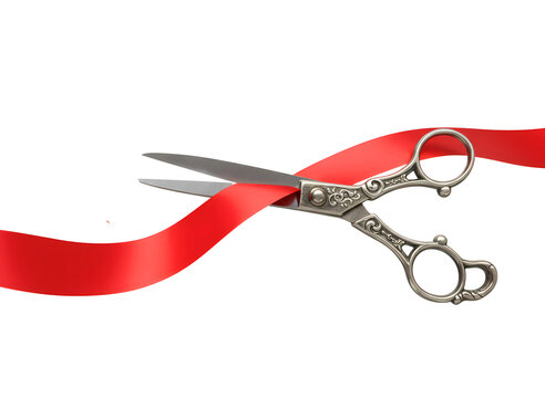 Silver scissors cutting a vibrant red ribbon isolated on transparent background