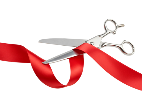 Silver scissors cutting a vibrant red ribbon isolated on transparent background