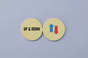 Up And Down concept with flat lay design of wooden blocks