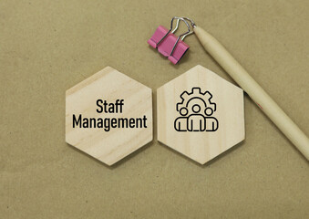 Staff Management concept with flat lay design of wooden blocks
