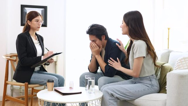 Infertility diagnosis reproductive fertility stress counseling depressed sadness couple therapy consultation reflect emotional burden in relationship, upset man in private session, marriage care.