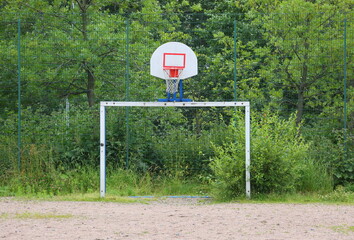 Mini-football goals and a basketball hoop on the sports ground