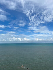 sea and sky with clouds and rocks
