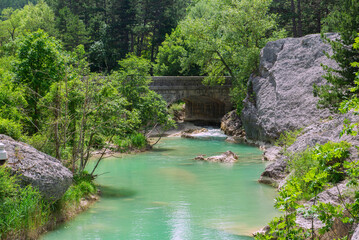 Fototapeta premium waters of the Drome river between the rocky banks in the south of France