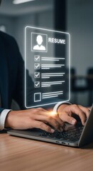 Professional applying for jobs using laptop, resume and skills checklist concept for career opportunities and online job search.