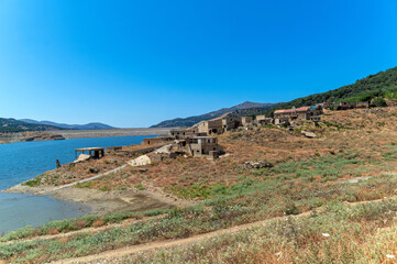 Ruins of Sfendali village submerged in the plateau waters of Crete, Greece