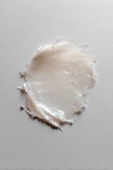 Creamy texture of skincare product on smooth background surface