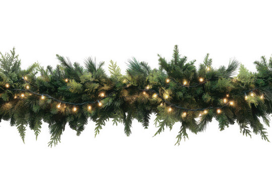 A christmas garland with green pine branches and warm glowing string lights