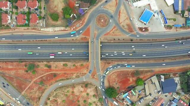 Aerial view of busy highway and city, Kenya.