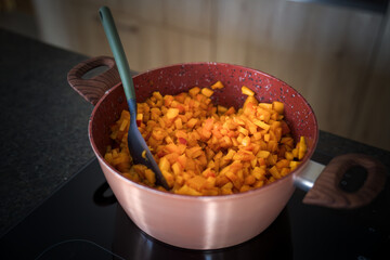 harvest of apricots - cooking homemade apricot jam and conservation