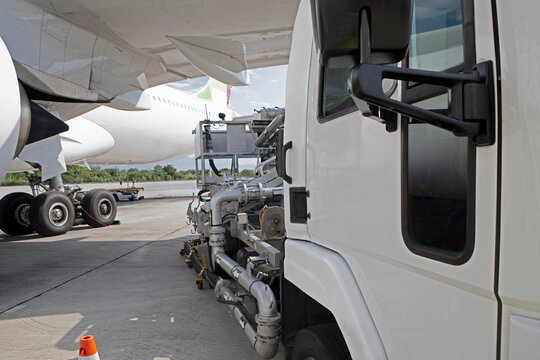 Refueling planes at the airport