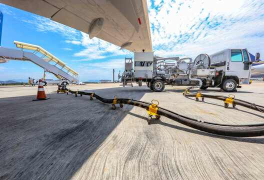Refueling planes at the airport