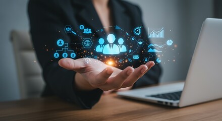 Executive displays digital transformation icons, showcasing modern leadership and innovative business strategies near a laptop.